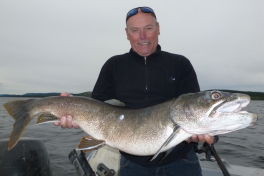 Seppi with his Trophy Lake Trout of 103 cm