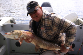 John with one of his Trophy Pike
